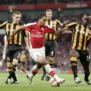 Theo Walcott Faces Defenders Andy Dawson and Kamil Zayatte as Arsenal Suffer 1:2 Defeat to Hull City in Barclays Premier League Theo Walcott Faces Defenders Andy Dawson and Kamil Zayatte as Arsenal Suffer 1:2 Defeat to Hull City in Barclays Premier League