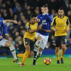 Theo Walcott Faces Off Against Everton's Leighton Baines and Ross Barkley in Premier League Clash
