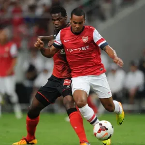 Theo Walcott Fouls by Danilson during Nagoya Grampus vs Arsenal Match, 2013