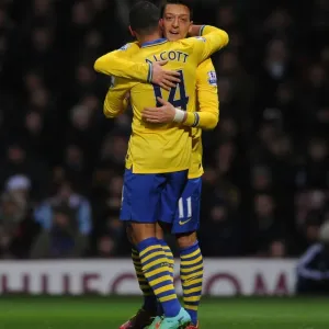 Theo Walcott and Mesut Ozil Celebrate Arsenal's Second Goal vs. West Ham United (2013-14)