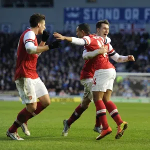 Theo Walcott, Olivier Giroud, and Aaron Ramsey Celebrate Arsenal's Goals Against Brighton & Hove Albion in FA Cup Match