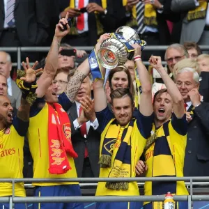 Theo Walcott, Olivier Giroud, Aaron Ramsey and Nacho Monreal (Arsenal) lift the FA Theo Walcott, Olivier Giroud, Aaron Ramsey and Nacho Monreal (Arsenal) lift the FA