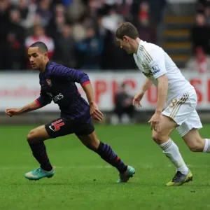 Theo Walcott Outmaneuvers Ben Davies in FA Cup Clash: Swansea vs. Arsenal (2012-13) Theo Walcott Outmaneuvers Ben Davies in FA Cup Clash: Swansea vs. Arsenal (2012-13)