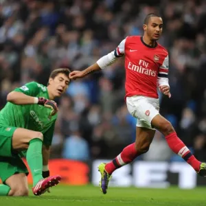 Theo Walcott Outmaneuvers Costel Pantilimon: Manchester City vs. Arsenal, Premier League, 2013 Theo Walcott Outmaneuvers Costel Pantilimon: Manchester City vs. Arsenal, Premier League, 2013
