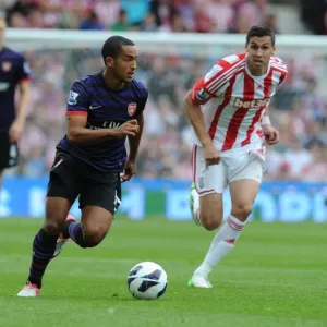 Theo Walcott Outmaneuvers Geoff Cameron: A Pivotal Moment from Stoke City vs. Arsenal (2012-13) Theo Walcott Outmaneuvers Geoff Cameron: A Pivotal Moment from Stoke City vs. Arsenal (2012-13)