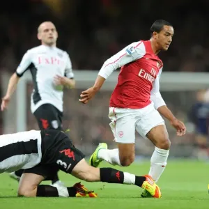 Theo Walcott Outmaneuvers John Arne Riisse: Arsenal vs Fulham, Premier League 2011-12 Theo Walcott Outmaneuvers John Arne Riisse: Arsenal vs Fulham, Premier League 2011-12
