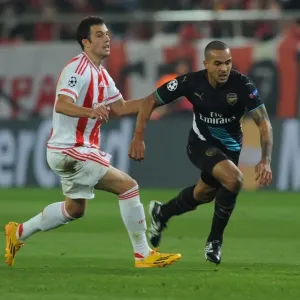 Theo Walcott Outmaneuvers Lukas Milivojevic: Olympiacos vs. Arsenal, UEFA Champions League, 2015 Theo Walcott Outmaneuvers Lukas Milivojevic: Olympiacos vs. Arsenal, UEFA Champions League, 2015