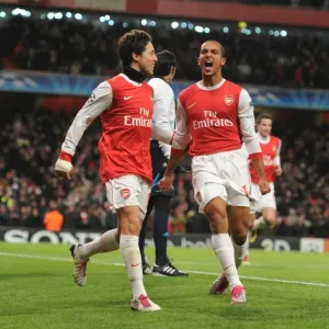 Theo Walcott and Samir Nasri Celebrate Arsenal's Second Goal vs. Partizan Belgrade in the UEFA Champions League Theo Walcott and Samir Nasri Celebrate Arsenal's Second Goal vs. Partizan Belgrade in the UEFA Champions League