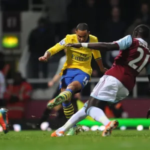 Theo Walcott Scores Against Mohamed Diame: A Pivotal Moment in the 2013-14 West Ham United vs. Arsenal Premier League Clash