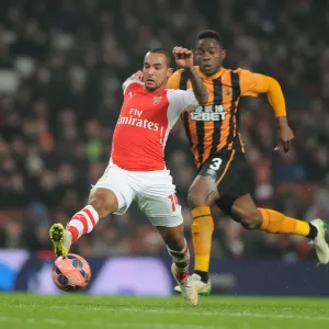 Theo Walcott Surges Past Hull's Maynor Figeroa in FA Cup Third Round Clash at Arsenal's Emirates Stadium