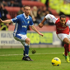 Theo Walcott Surges Past Wigan's David Jones in Premier League Clash (Wigan Athletic vs Arsenal, 2011-12)