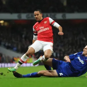 Theo Walcott vs Ben Turner: A Footballing Battle at the Emirates - Arsenal vs Cardiff City, Premier League 2013-14 Theo Walcott vs Ben Turner: A Footballing Battle at the Emirates - Arsenal vs Cardiff City, Premier League 2013-14