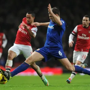 Theo Walcott vs Ben Turner: Intense Battle at the Emirates - Arsenal vs Cardiff City, Premier League 2013-14 Theo Walcott vs Ben Turner: Intense Battle at the Emirates - Arsenal vs Cardiff City, Premier League 2013-14