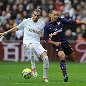 Theo Walcott vs Chico Flores: Intense Battle in Swansea v Arsenal FA Cup Match