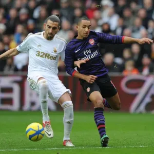 Theo Walcott vs Chico Flores: Intense Battle in Swansea v Arsenal FA Cup Match Theo Walcott vs Chico Flores: Intense Battle in Swansea v Arsenal FA Cup Match