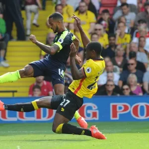 Theo Walcott vs Christian Kabasele: A Premier League Face-Off at Vicarage Road Theo Walcott vs Christian Kabasele: A Premier League Face-Off at Vicarage Road