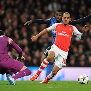 Theo Walcott vs. Danijel Subasic: Intense Battle in Arsenal v Monaco UEFA Champions League Clash