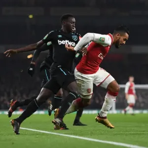 Theo Walcott vs. Domingos Quina: A Battle of Skills in Arsenal's Carabao Cup Clash Theo Walcott vs. Domingos Quina: A Battle of Skills in Arsenal's Carabao Cup Clash