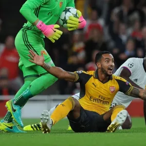Theo Walcott vs. Eder Balanta: A Controversial Penalty Call in Arsenal's UEFA Champions League Clash with FC Basel Theo Walcott vs. Eder Balanta: A Controversial Penalty Call in Arsenal's UEFA Champions League Clash with FC Basel