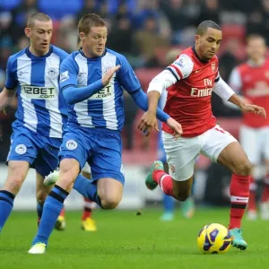 Theo Walcott vs. James McCarthy: Intense Battle in Wigan Athletic vs. Arsenal (2012-13)