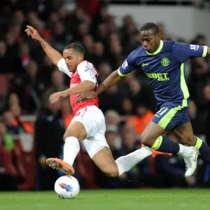 Theo Walcott vs. Maynor Figueroa: A Fierce Rivalry Unfolds at Emirates Stadium (Arsenal vs. Wigan Athletic, 2012)
