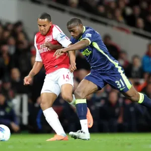Theo Walcott vs. Maynor Figueroa: A Fight for Control at Emirates Stadium - Arsenal vs. Wigan Athletic (2012)