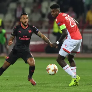 Theo Walcott vs. Mitchell Donald: Clash in the Europa League between Crvena Zvezda and Arsenal FC