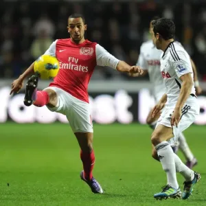 Theo Walcott vs. Neil Taylor: A Footballing Battle at Swansea City (2011-12)
