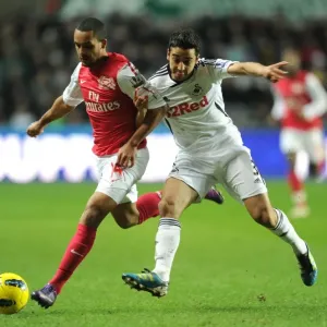 Theo Walcott vs Neil Taylor: Intense Battle in Swansea City vs Arsenal Premier League Clash