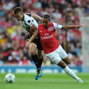 Theo Walcott vs Neuton: Arsenal's Battle in the UEFA Champions League Play-Off Against Udinese (2011)