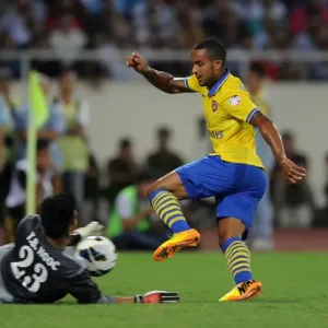 Theo Walcott vs Tran Buu Ngoc: Vietnam Stands Strong Against Arsenal Theo Walcott vs Tran Buu Ngoc: Vietnam Stands Strong Against Arsenal