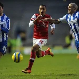Theo Walcott vs. Wayne Bridge and Adam El-Abd: Intense Battle in FA Cup Match between Brighton & Hove Albion and Arsenal