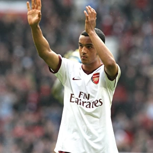 Theo Walcott waves to the Arsenal fabs after the match