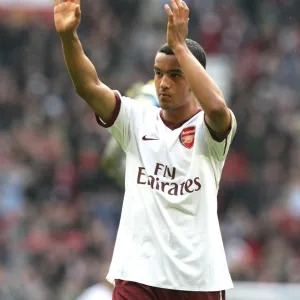 Theo Walcott waves to the Arsenal fabs after the match