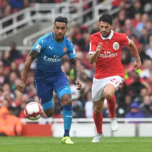Theo Walcott's Agile Moves: Outmaneuvering Pizzi in Arsenal's Emirates Cup Victory Theo Walcott's Agile Moves: Outmaneuvering Pizzi in Arsenal's Emirates Cup Victory