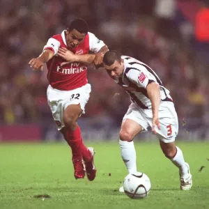 Theo Walcott's Brace: Arsenal Cruise Past West Brom in Carling League Cup