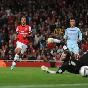 Theo Walcott's Brace: Arsenal's Thrashing of Coventry City in Capital One Cup