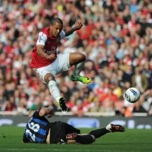 Theo Walcott's Brace Leads Arsenal to 3-1 Victory over Stoke City in Premier League