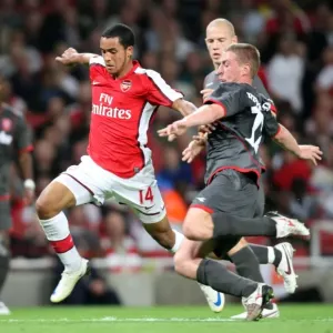 Theo Walcott's Brilliant Performance: Arsenal's 4-0 UEFA Champions League Victory Over FC Twente