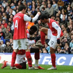 Theo Walcott's Double: A Celebration with Fabregas and Adebayor Theo Walcott's Double: A Celebration with Fabregas and Adebayor