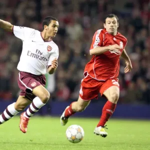 Theo Walcott's Game-Changing Moment: Beating Mascherano to Set Up Adebayor's Goal in Arsenal's UEFA Champions League Battle at Anfield Theo Walcott's Game-Changing Moment: Beating Mascherano to Set Up Adebayor's Goal in Arsenal's UEFA Champions League Battle at Anfield