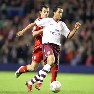Theo Walcott's Game-Changing Moment: Outmaneuvering Mascherano to Set Up Adebayor's Goal in Arsenal's UEFA Champions League Battle at Anfield Theo Walcott's Game-Changing Moment: Outmaneuvering Mascherano to Set Up Adebayor's Goal in Arsenal's UEFA Champions League Battle at Anfield