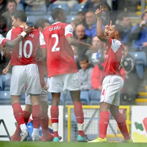 Theo Walcott's Historic Debut Goal: Arsenal's Win Against Blackburn Rovers (2010) - Celebrating with Diaby, Fabregas, and van Persie