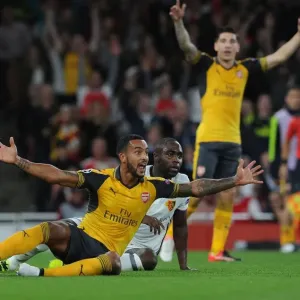 Theo Walcott's Penalty Plea: Arsenal's Battle for a Decisive Spot Kick vs. FC Basel Theo Walcott's Penalty Plea: Arsenal's Battle for a Decisive Spot Kick vs. FC Basel