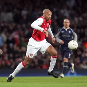 Thierry Henry (Arsenal) Abdoulaye Meite (Bolton) Thierry Henry (Arsenal) Abdoulaye Meite (Bolton)
