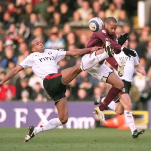 Thierry Henry (Arsenal) Alain Goma (Fulham). Fulham 0: 4 Arsenal. FA Premiership Thierry Henry (Arsenal) Alain Goma (Fulham). Fulham 0: 4 Arsenal. FA Premiership