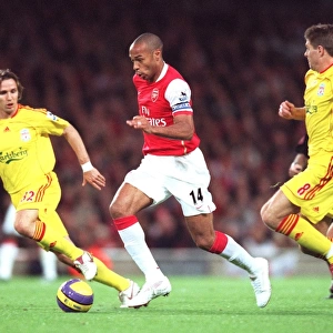 Thierry Henry (Arsenal) Bolo Zenden and Steven Garrard (Liverpool)