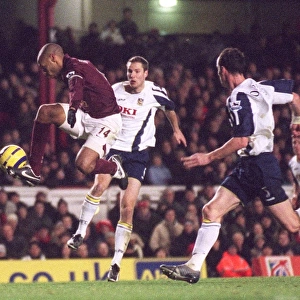 Thierry Henry (Arsenal) Brian Priske and Andy O Brien (Portsmouth)
