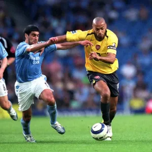 Thierry Henry (Arsenal) Claudio Reyna (Manchester City). Manchester City 1 - 3 Arsenal