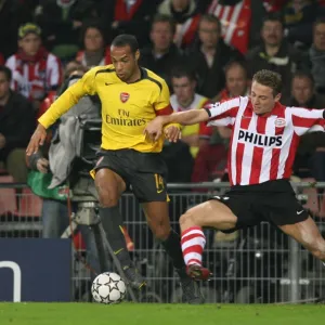 Thierry Henry (Arsenal) Jan Kromkamp (PSV)